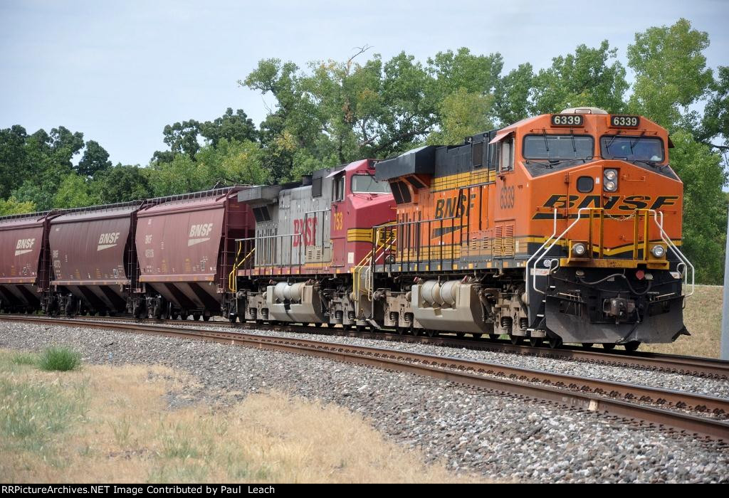 Grain train rolls south on the main